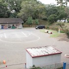 北側高土塁上より本丸内部を見る