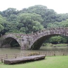 石造り眼鏡橋越しの諫早城
