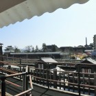 山手御門から見た時の鐘・稲荷櫓・天守台・甲府駅