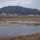 吉田郡山城全景。旧本城は正面中腹あたり。