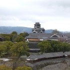 ⑩	市役所14階から見た熊本城全景