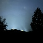 ライトアップされた石垣と明けの明星