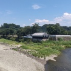 ⑨	球磨川から眺めた隅櫓（人吉城全景）