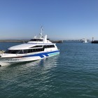 師崎港係留乗船高速船、向こうの島は日間賀島