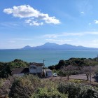 ③	模擬天守から雲仙島原を眺める