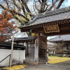 ⑦	明行寺の門（内牧城から移築されたもの）