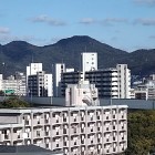 ⑦	名島城本丸から立花山（中央）を眺める