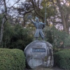 清正公石曵きの像