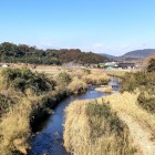 ④	田北鎮周と佐伯宗天が討死した切原川（背後は高城）