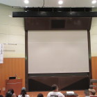 加藤理文氏講演前のスライド幕と講演札